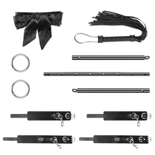 Ensemble barre d'écartement avec menottes, fouet et bandeau pour les yeux