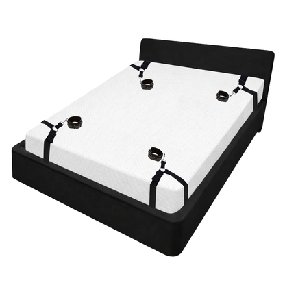 Bed restraints with positioning strap, blindfold, and feather riding crop