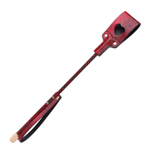 Crocodile-textured riding crop