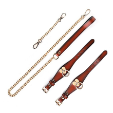 Heart-shaped handcuffs and leash