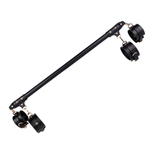 Spreader bar and handcuffs