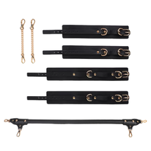 Spreader bar and handcuffs