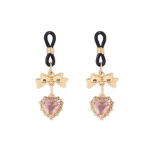 Pinces à mamelons ornées boucle et coeur